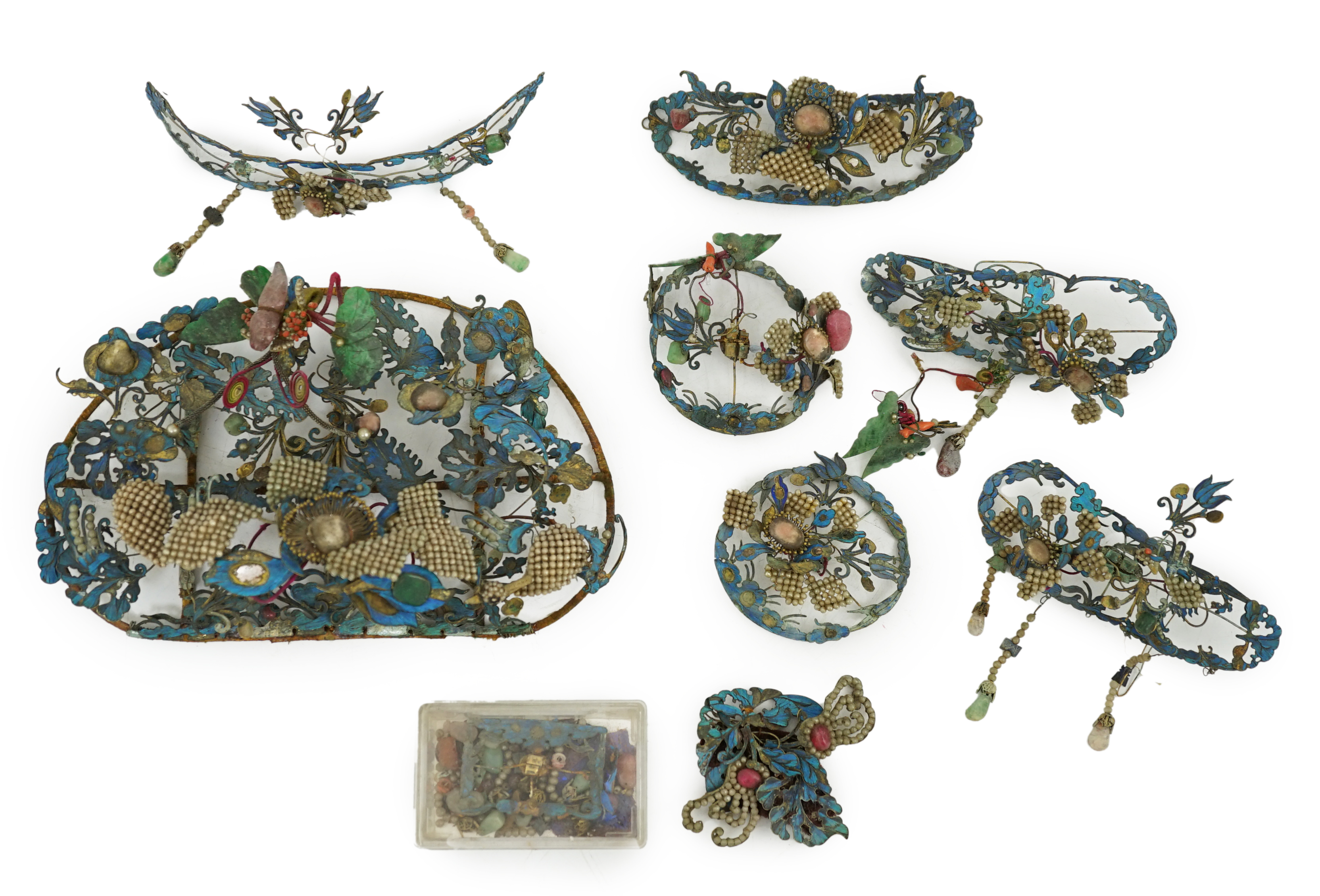 A group of eight Chinese kingfisher feather, jade, seed pearl, coral and hardstone mounted headdresses and ornaments, late Qing dynasty, some losses